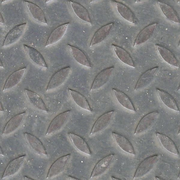 Seamless texture of sheet of grey metal with embedded leaf-like shapes in surface.